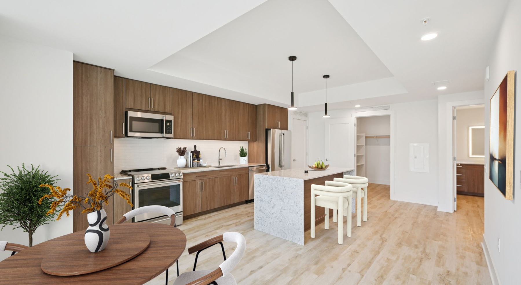 oak kitchen cabinets with waterfall island and pantry