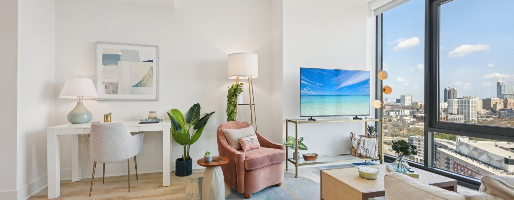 living room with floor to ceiling windows 