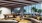 large seating area with couches and windows