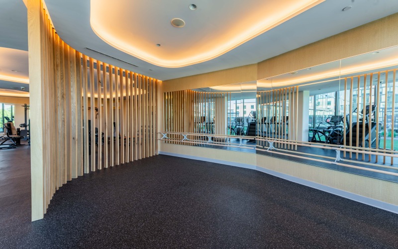 state-of-the-art fitness area with yoga barre room
