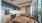 lounge area with a kitchen area and tables and chairs