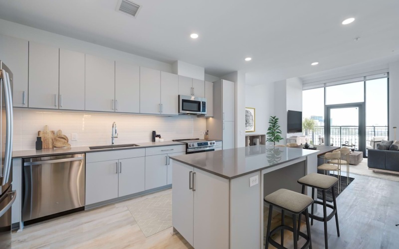kitchen with an island and bar stools