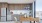 kitchen and dining area with a table and chairs