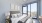 bedroom with a large window