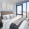 bedroom with a large window